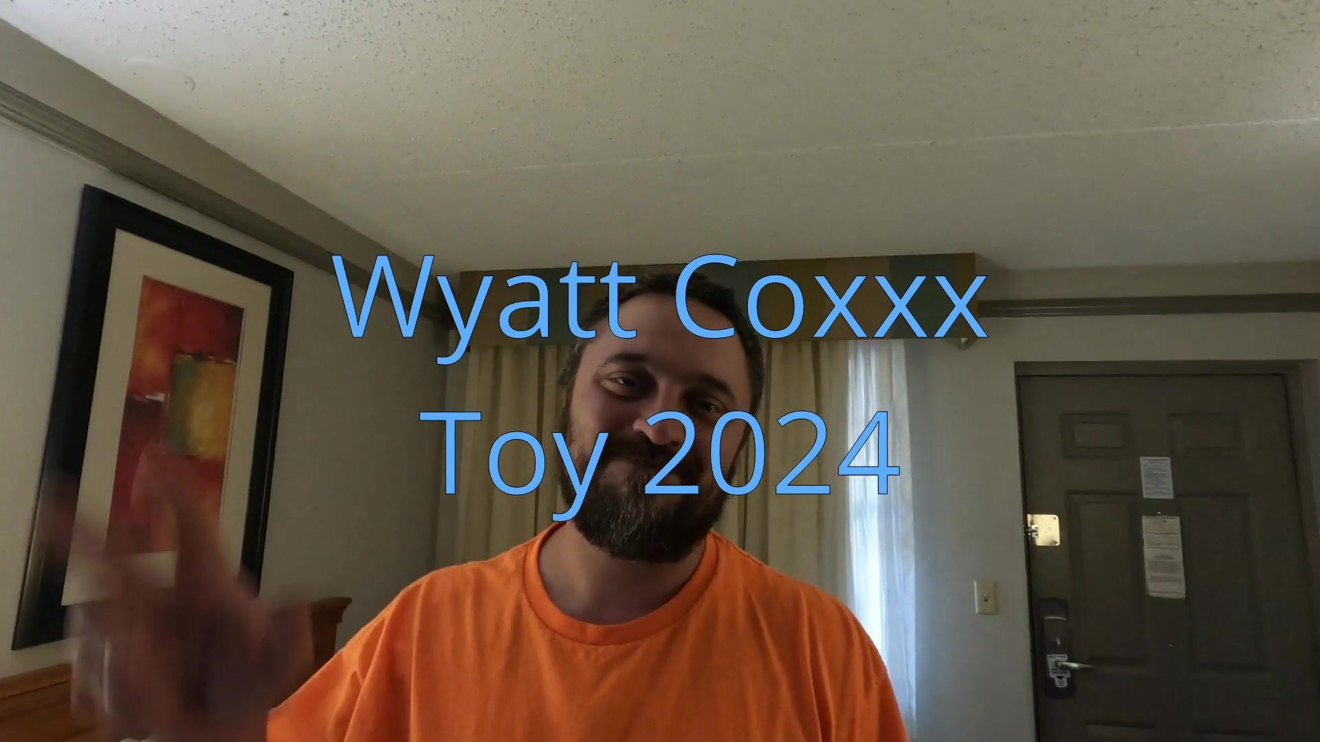 Wyatt Coxxx plays with a toy in his ass